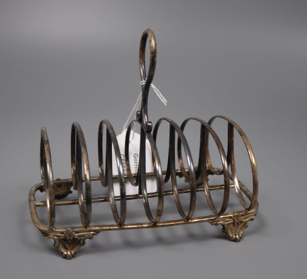 A Victorian silver seven bar toastrack, William Evans, London, 1865, height 13.5cm, 70z.